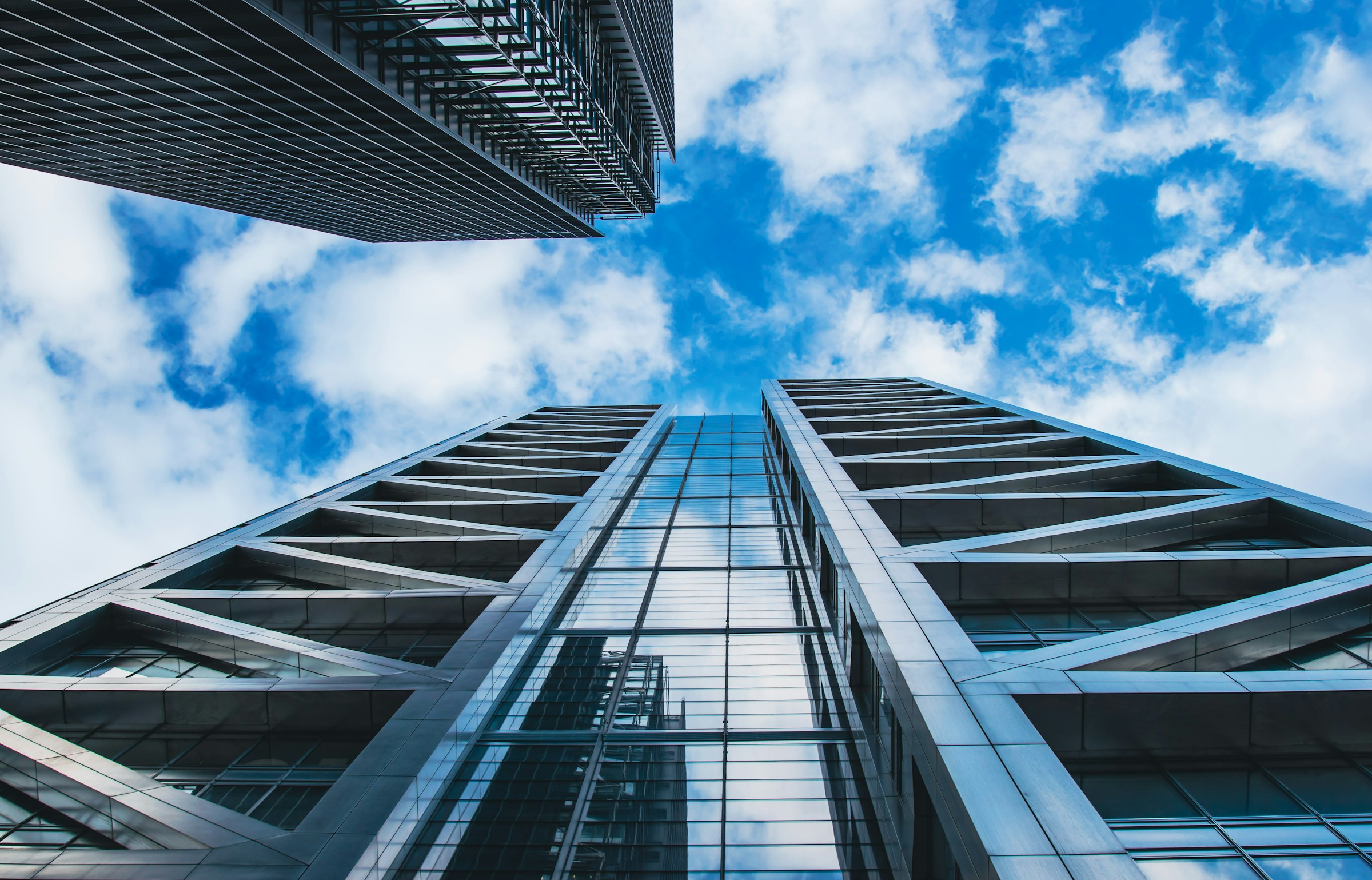looking up at the outside of a tall building